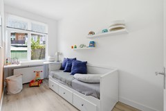 bedroom with shelves.jpeg